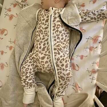 Leopard print baby sleepsuit deals